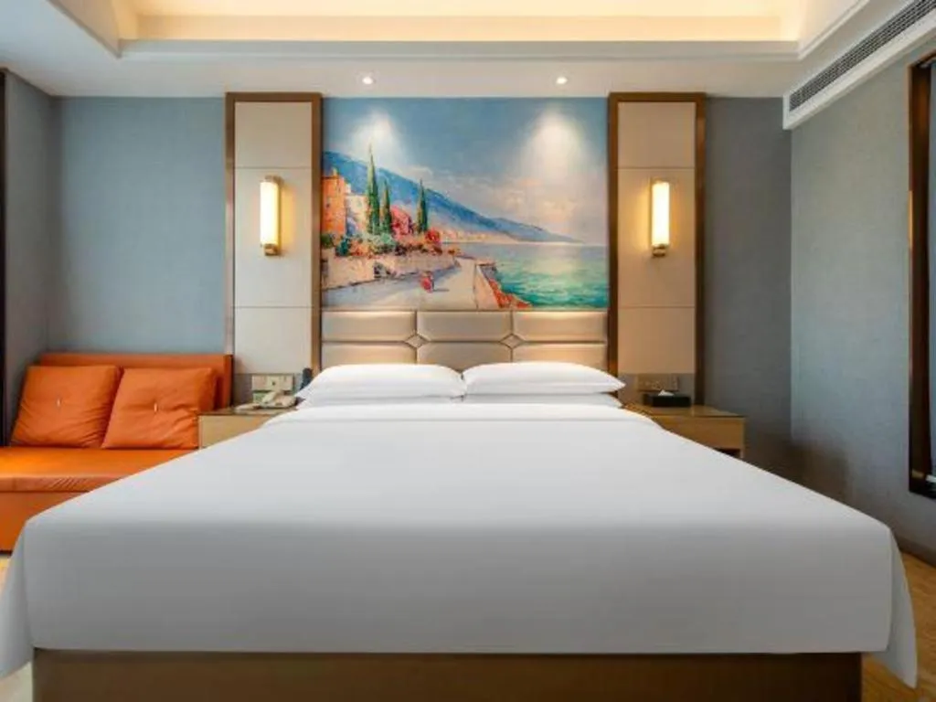 Bed in Vienna Hotel Wuhan Guobo Jiangang Metro Station