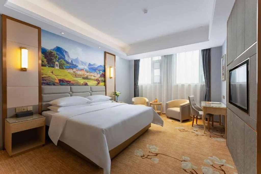 Bed in Vienna Hotel Wuhan Guobo Jiangang Metro Station