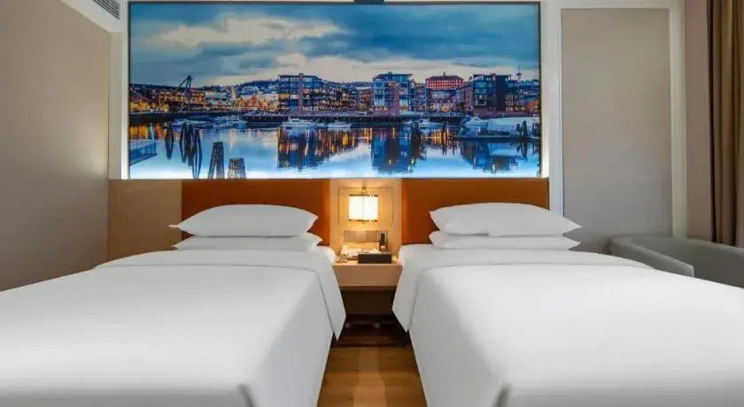 Bed in Vienna Hotel Wuhan Guobo Jiangang Metro Station Bed in Vienna Hotel Wuhan Guobo Jiangang Metro Station