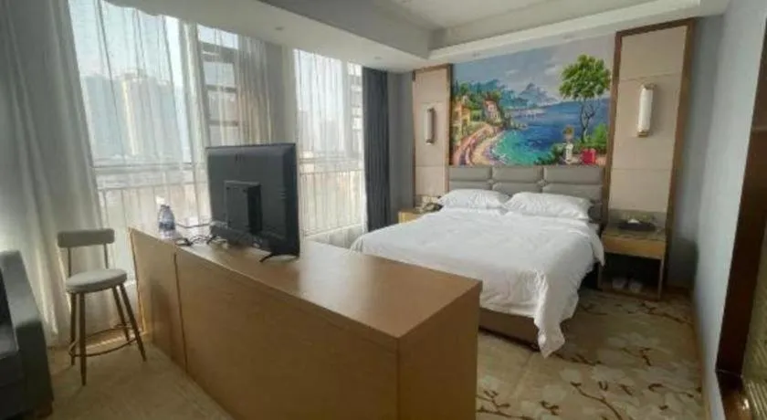 Bed in Vienna Hotel Wuhan Guobo Jiangang Metro Station