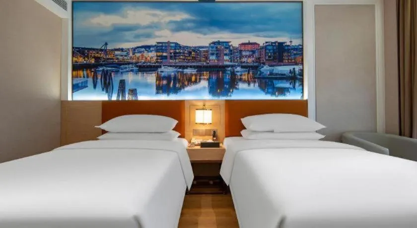 Bed in Vienna Hotel Wuhan Guobo Jiangang Metro Station