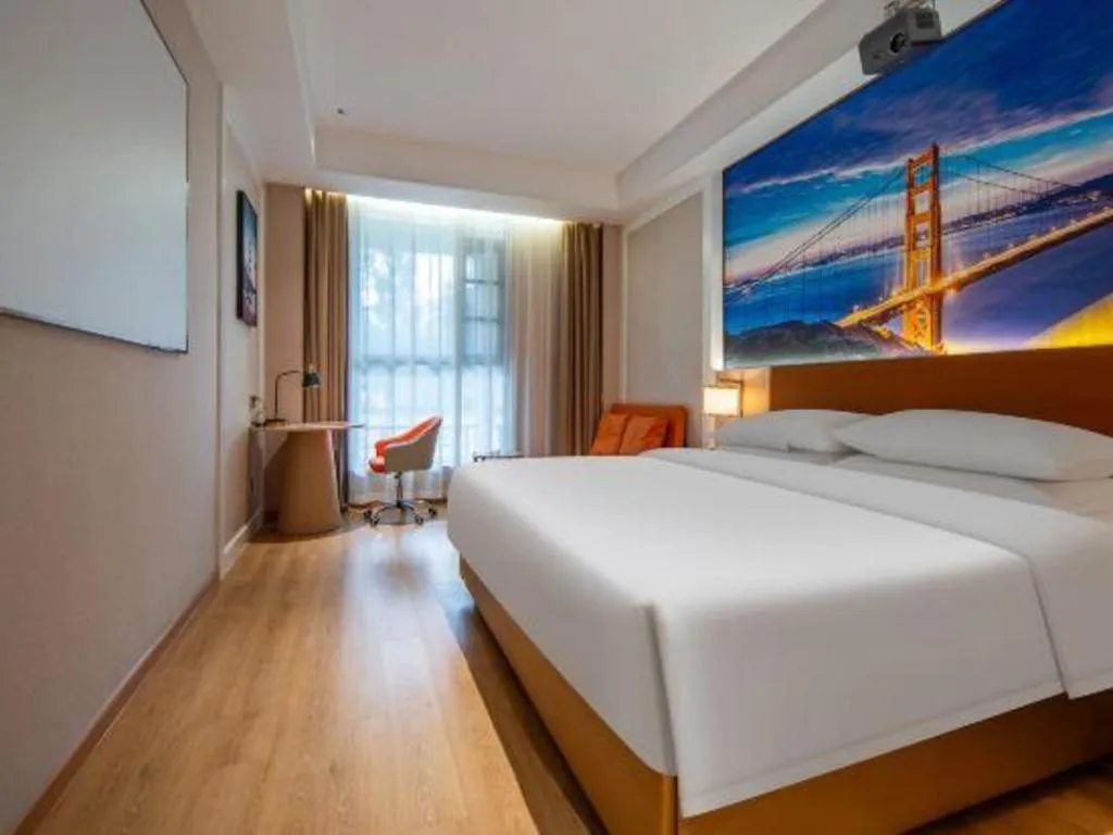 Bed in Vienna Hotel Wuhan Guobo Jiangang Metro Station