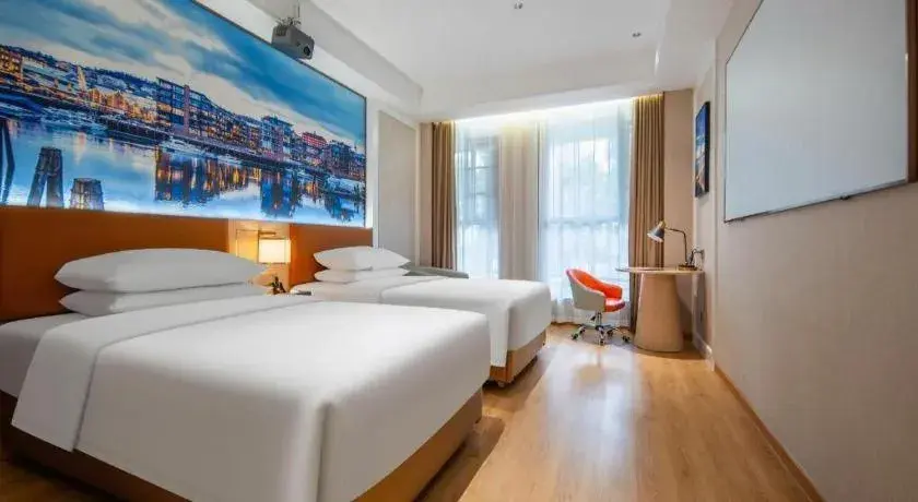 Bed in Vienna Hotel Wuhan Guobo Jiangang Metro Station Bed in Vienna Hotel Wuhan Guobo Jiangang Metro Station