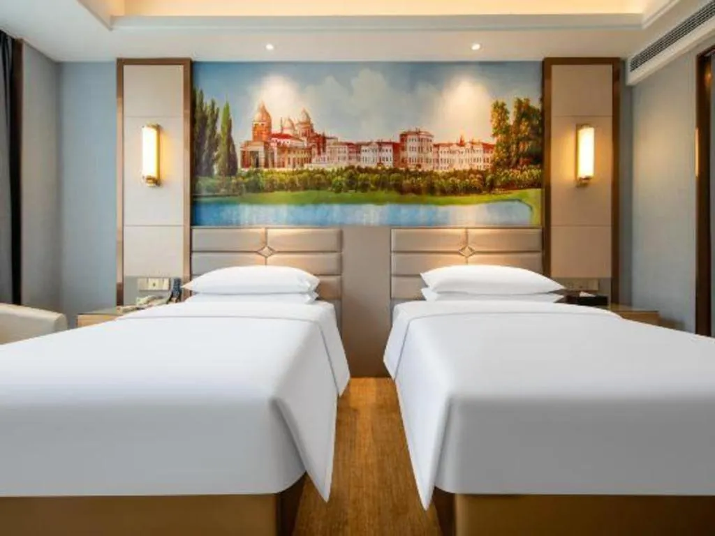 Bed in Vienna Hotel Wuhan Guobo Jiangang Metro Station