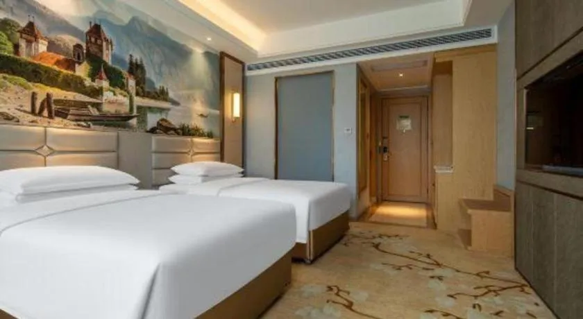 Bed in Vienna Hotel Wuhan Guobo Jiangang Metro Station