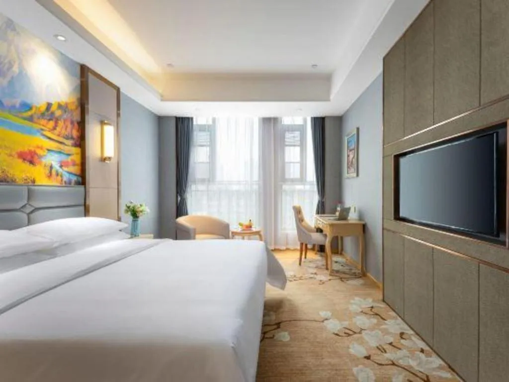 Bed in Vienna Hotel Wuhan Guobo Jiangang Metro Station