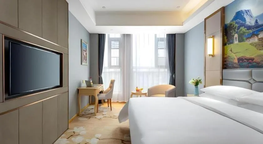 Bed in Vienna Hotel Wuhan Guobo Jiangang Metro Station