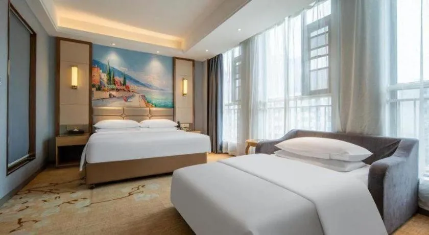 Bed in Vienna Hotel Wuhan Guobo Jiangang Metro Station