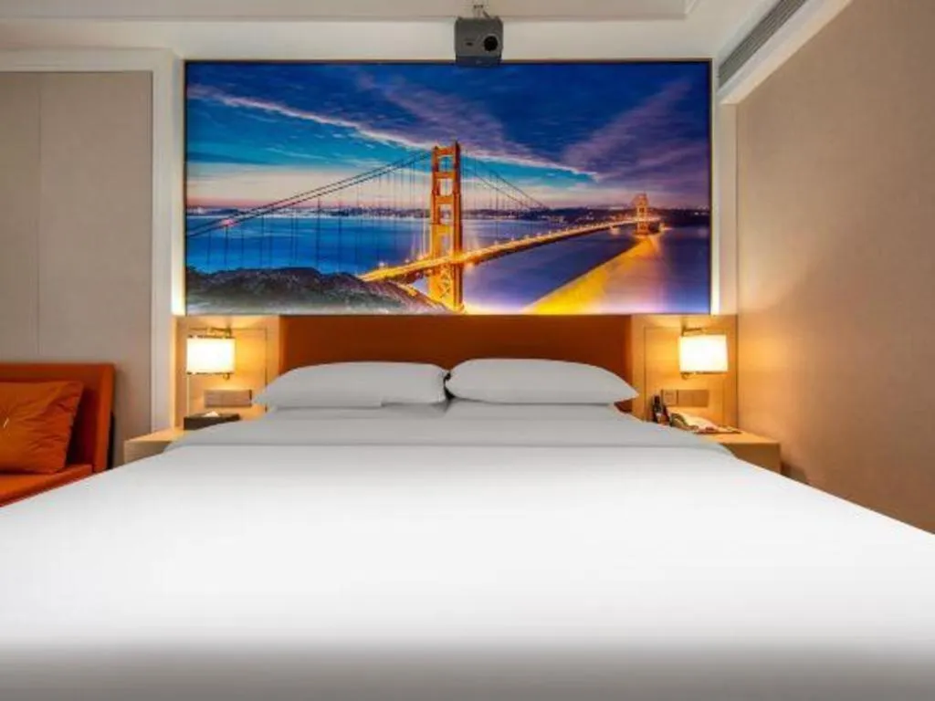 Bed in Vienna Hotel Wuhan Guobo Jiangang Metro Station