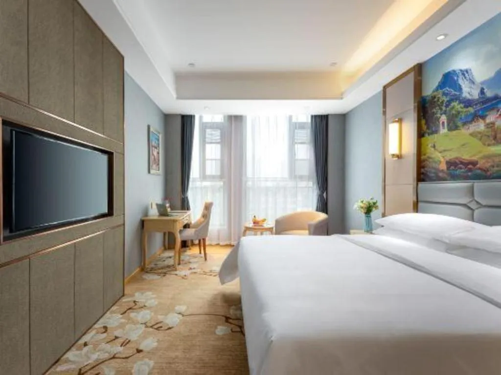 Bed in Vienna Hotel Wuhan Guobo Jiangang Metro Station