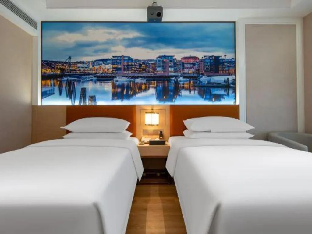 Bed in Vienna Hotel Wuhan Guobo Jiangang Metro Station