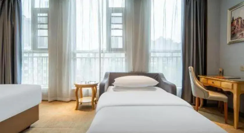 Bed in Vienna Hotel Wuhan Guobo Jiangang Metro Station Bed in Vienna Hotel Wuhan Guobo Jiangang Metro Station