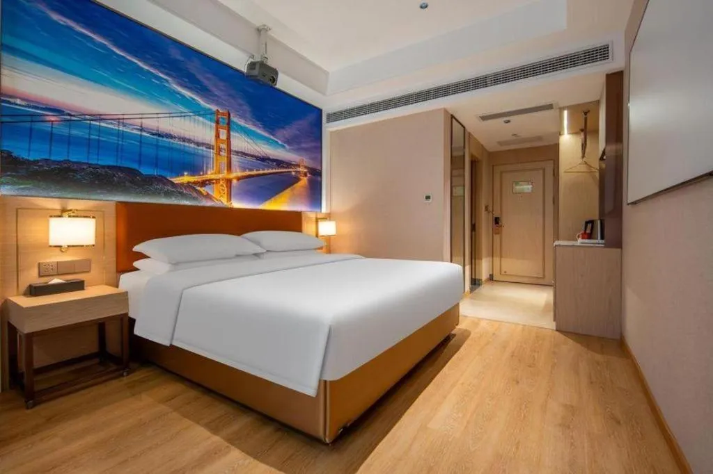 Bed in Vienna Hotel Wuhan Guobo Jiangang Metro Station