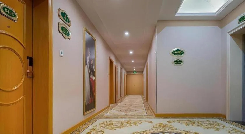 Bed in Vienna Hotel Chongqing Wanzhou Wanda Plaza