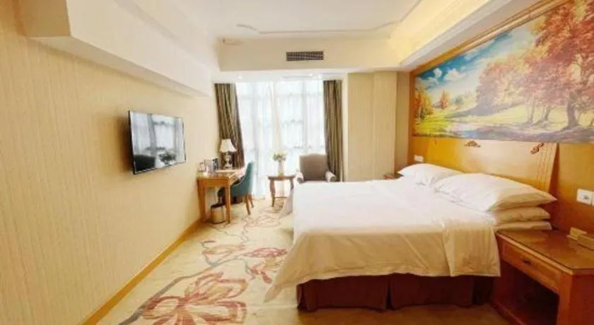 Bed in Vienna Hotel Chongqing Wanzhou Wanda Plaza