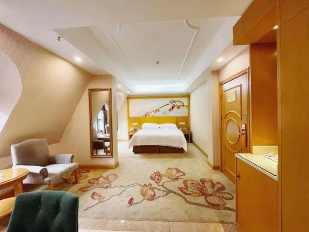 Bed in Vienna Hotel Chongqing Wanzhou Wanda Plaza