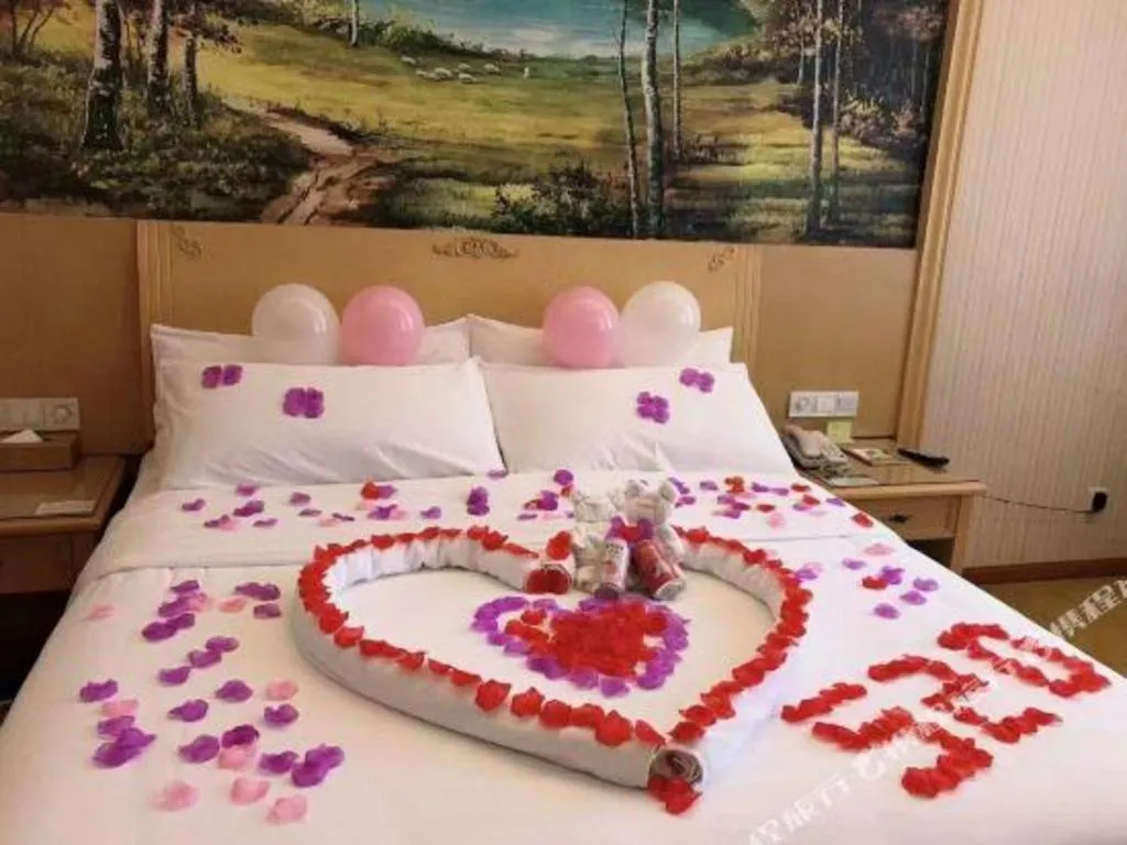 Bed in Vienna Hotel Chongqing Wanzhou Wanda Plaza