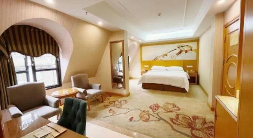 Bed in Vienna Hotel Chongqing Wanzhou Wanda Plaza