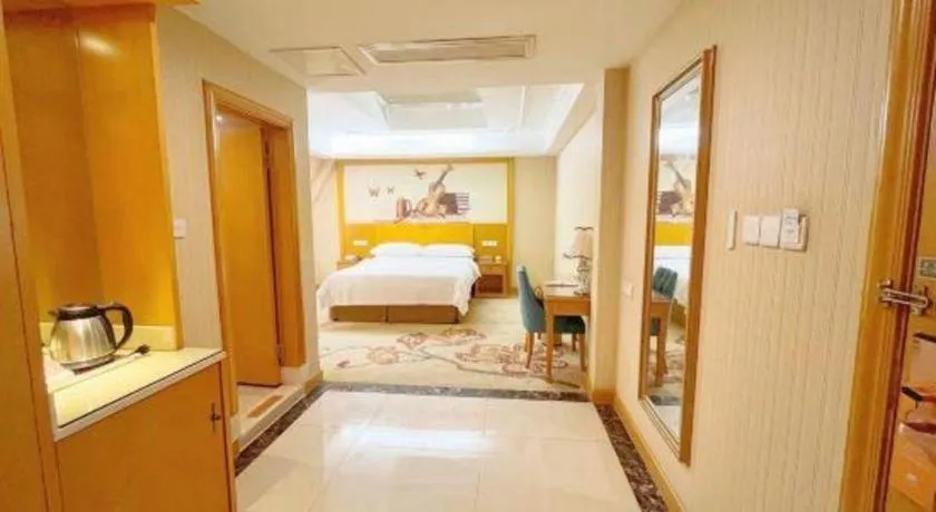 Bed in Vienna Hotel Chongqing Wanzhou Wanda Plaza