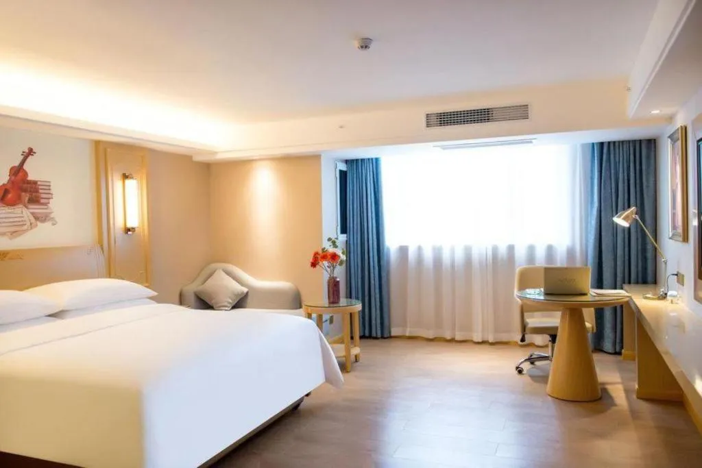 Bed in Vienna Hotel Chongqing Lijiatuo Pedestrian Street