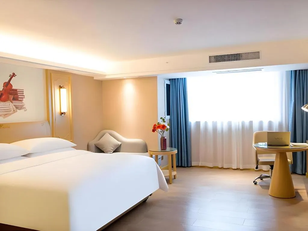 Bed in Vienna Hotel Chongqing Lijiatuo Pedestrian Street