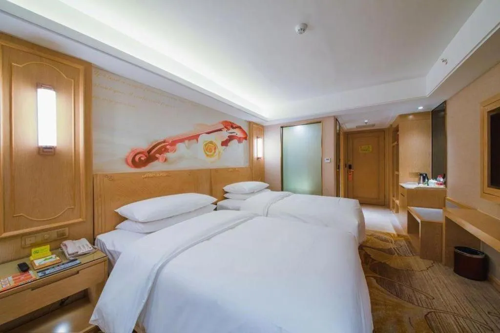 Bed in Vienna Hotel Chongqing Lijiatuo Pedestrian Street