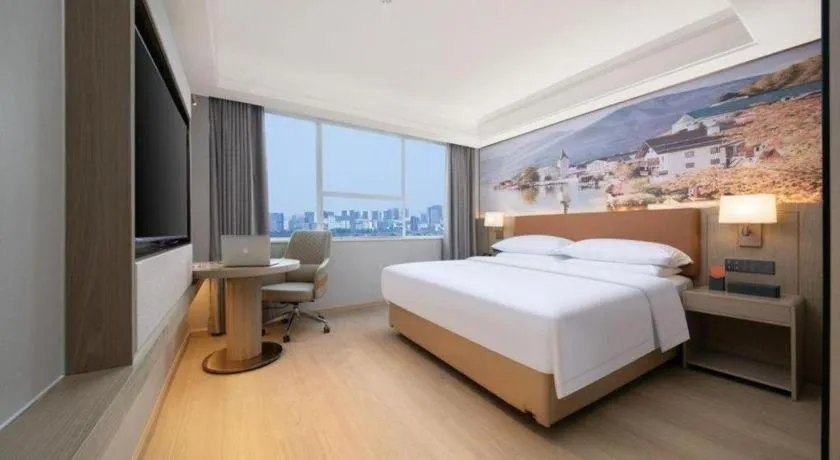 Bed in Vienna Hotel Hubei Jinzhou Changjiang University