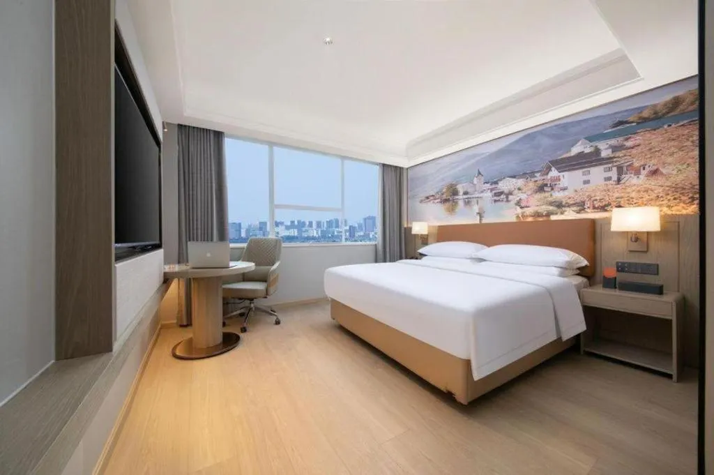 Bed in Vienna Hotel Hubei Jinzhou Changjiang University