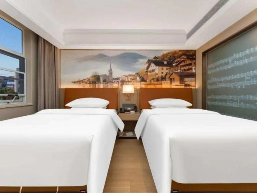 Bed in Vienna Hotel Hubei Jinzhou Changjiang University
