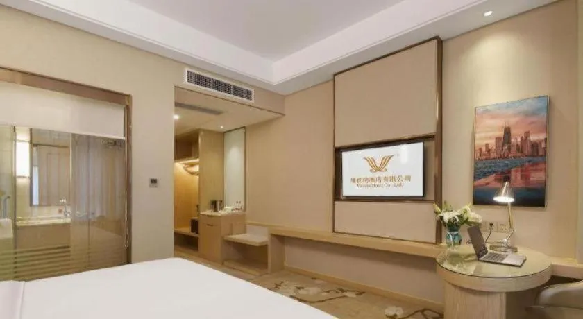 Bed in Vienna Hotel Chongqing Fengdu