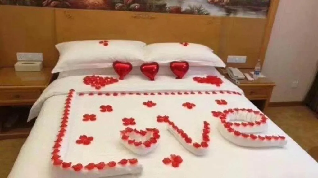 Bed in Vienna Hotel Chongqing Fengdu