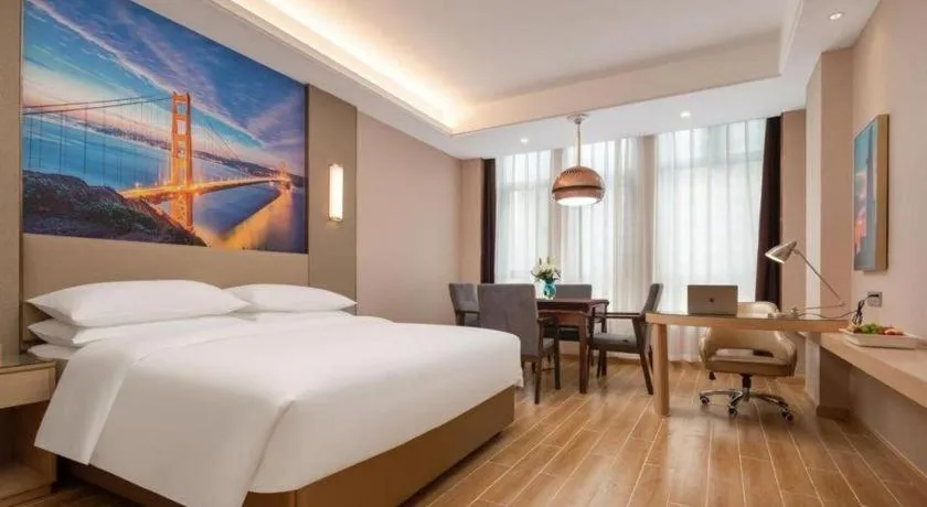 Bed in Vienna Hotel Chongqing Fengdu