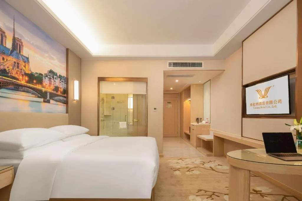 Bed in Vienna Hotel Chongqing Fengdu