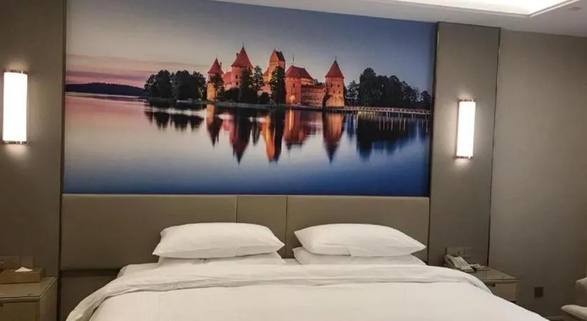 Bed in Vienna Hotel Chongqing Fengdu