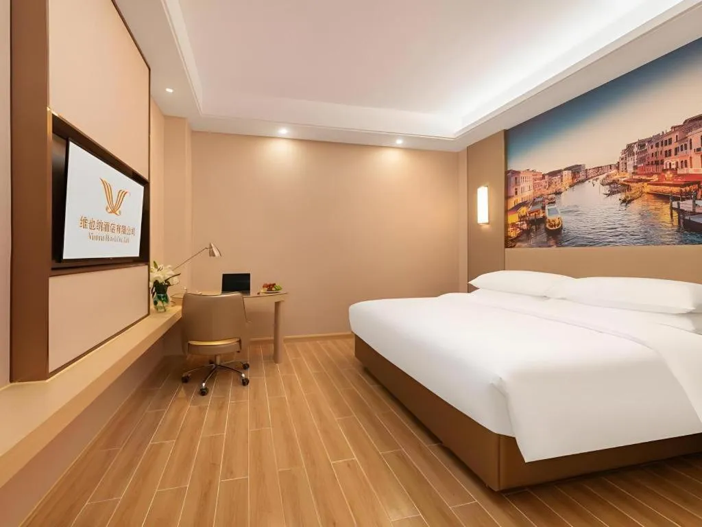 Bed in Vienna Hotel Chongqing Fengdu