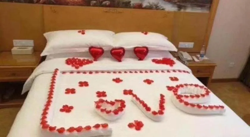 Bed in Vienna Hotel Chongqing Fengdu