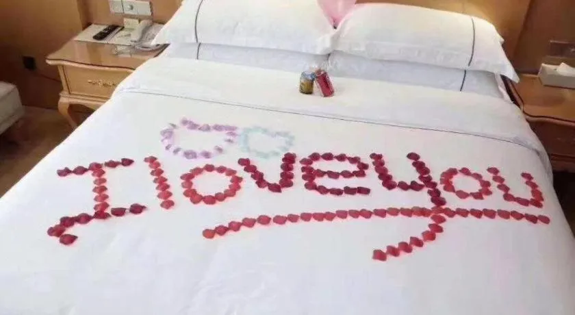 Bed in Vienna Hotel Chongqing Fengdu