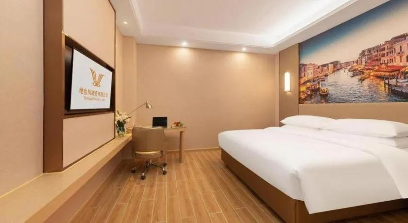 Bed in Vienna Hotel Chongqing Fengdu