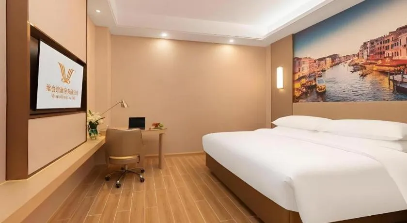 Bed in Vienna Hotel Chongqing Fengdu