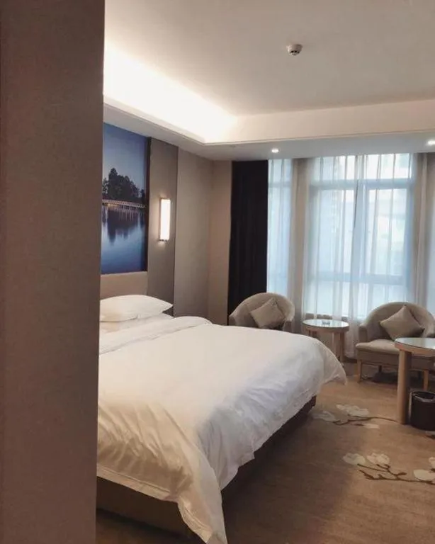 Bed in Vienna Hotel Chongqing Fengdu