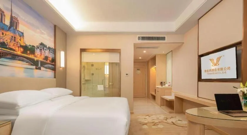 Bed in Vienna Hotel Chongqing Fengdu