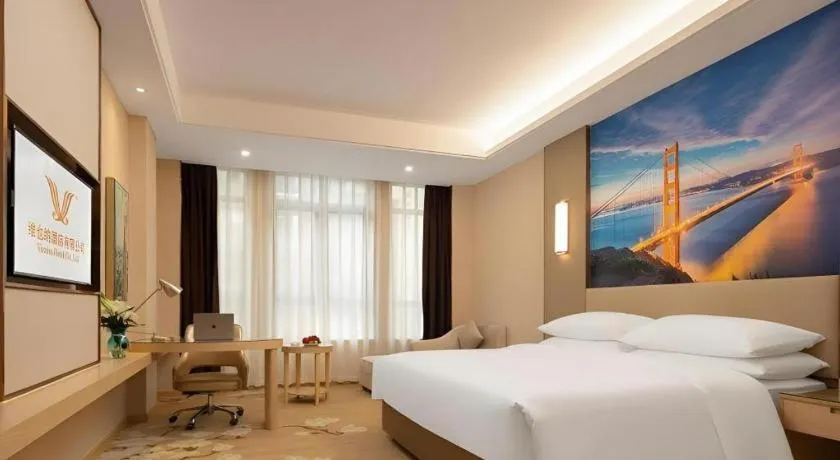 Bed in Vienna Hotel Chongqing Fengdu