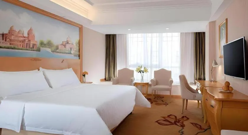 Bed in Vienna Hotel Guangxi Guilin Gongchengtianjie