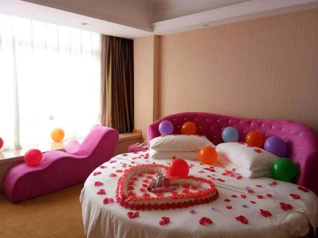 Bed in Vienna Hotel Guangxi Guilin Gongchengtianjie