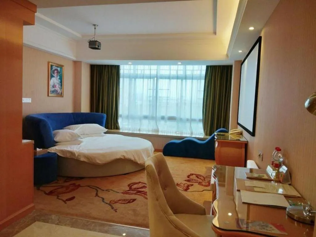 Bed in Vienna Hotel Guangxi Guilin Gongchengtianjie