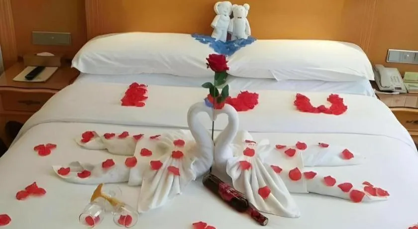 Bed in Vienna Hotel Guangxi Guilin Gongchengtianjie