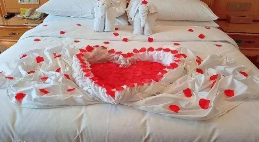 Bed in Vienna Hotel Guangxi Guilin Gongchengtianjie