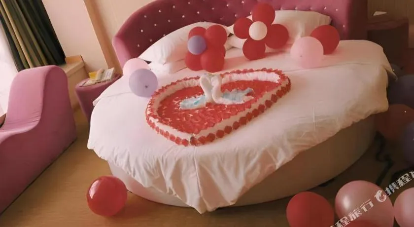 Bed in Vienna Hotel Guangxi Guilin Gongchengtianjie