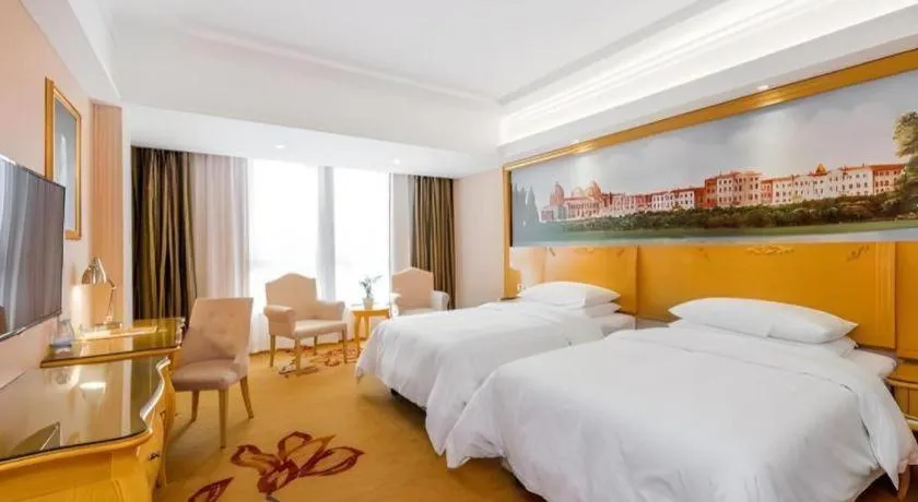 Bed in Vienna Hotel Guangxi Guilin Gongchengtianjie