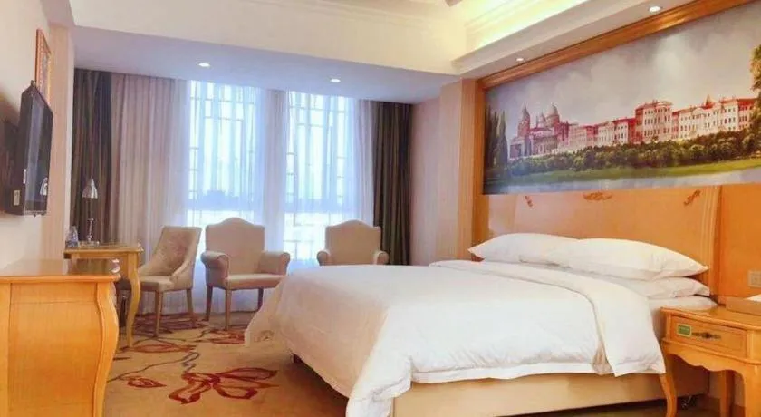 Bed in Vienna Hotel Guangxi Guilin Gongchengtianjie